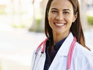 Female doctor standing outside
