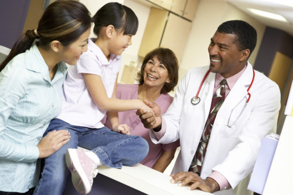 boost your clinical skills with locum tenens - image of happy physician and patients