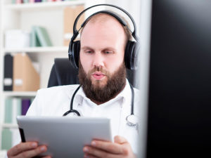Locum Tenens Physician Listening to Podcast