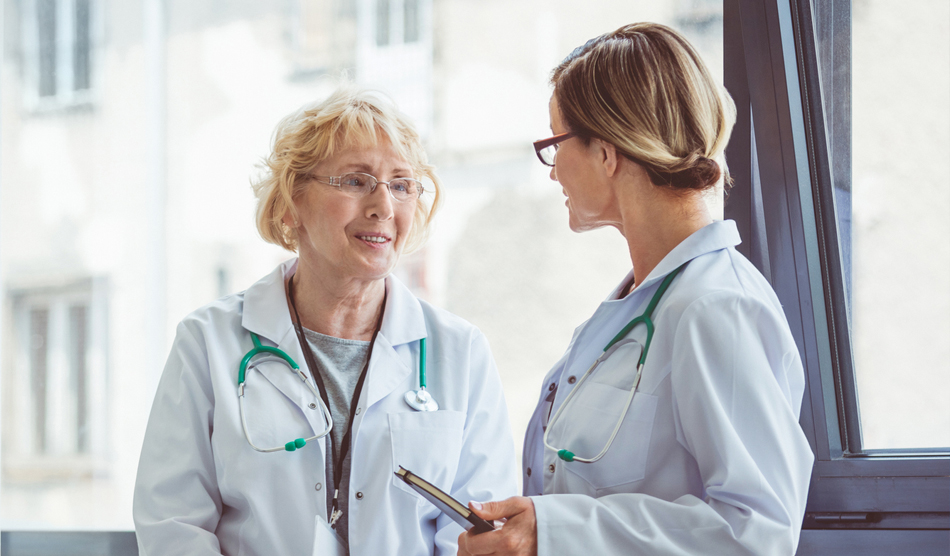 Two physicians talking to each other