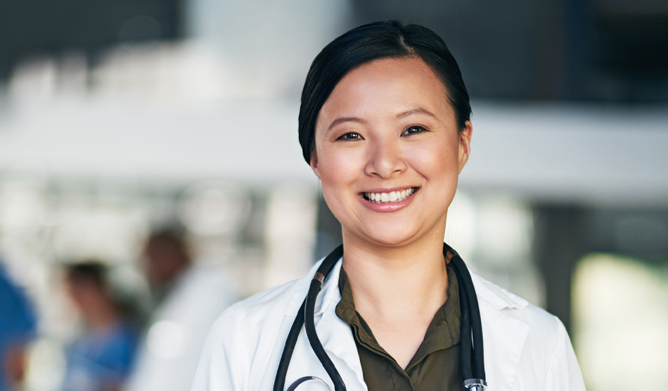 Woman physician smiling at camera