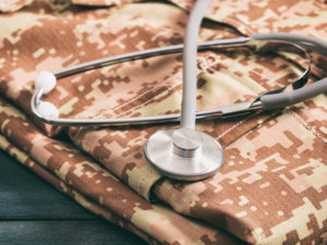 Military print scrubs with stethoscope