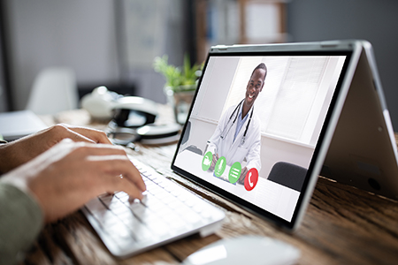 Patient connecting with doctor through telehealth program