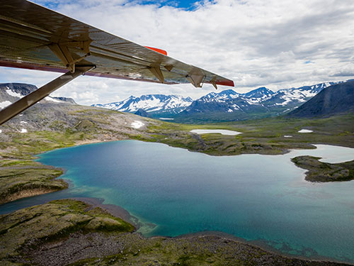Bush plane flying over Alaska