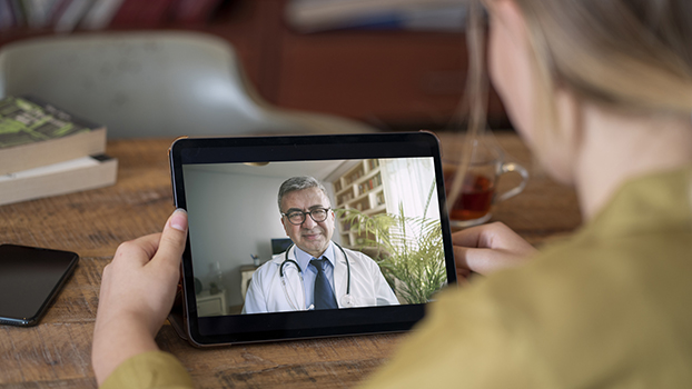 Physician and patient doing telemedicine visit 