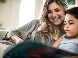 Physician mom reading to child