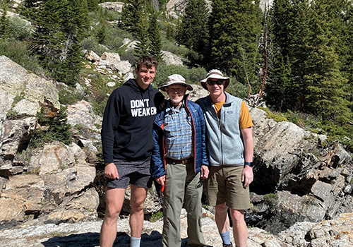Dr Quinn and his sons hiking