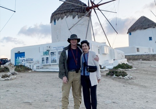 Dr Quinn and wife in front of windmill
